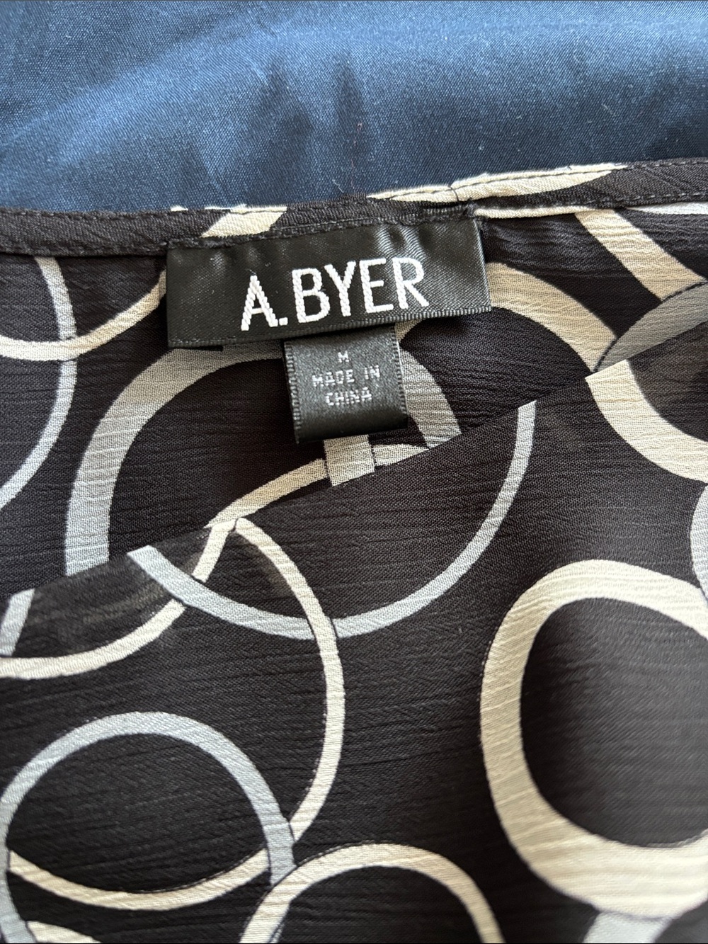 A. Byer Black Blouse with White Ring Print and Front Knot - Picture 7 of 8